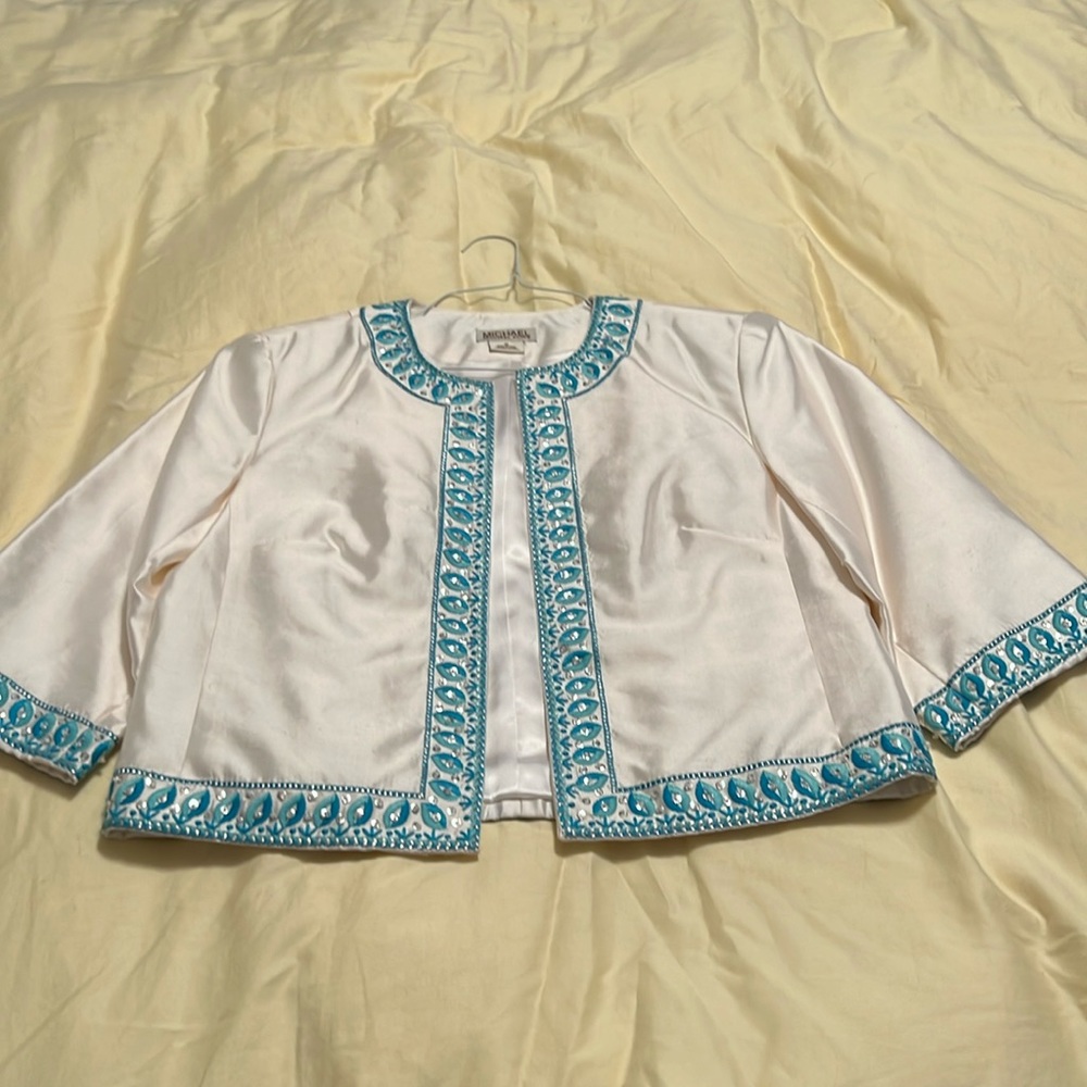 White Michael Kors Silk jacket with blue embroidery trim and beading.